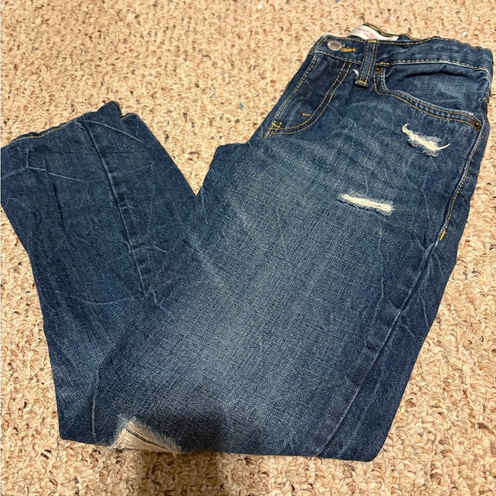 Distressed Blue Jeans
